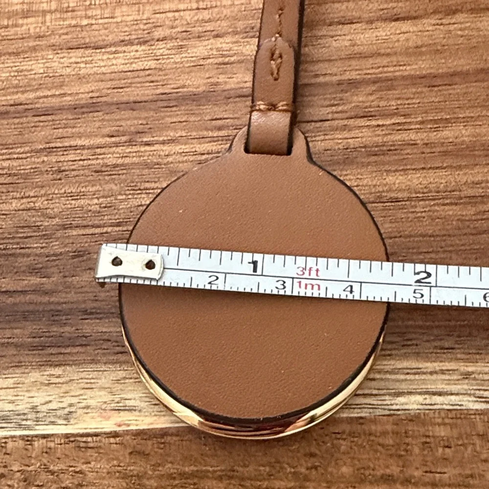 Michael Kors Brown and Gold bag tag